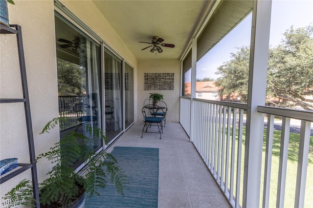 5437 Compass Pt Unit 00, Oxford, FL 34484 - balcony with a ceiling fan