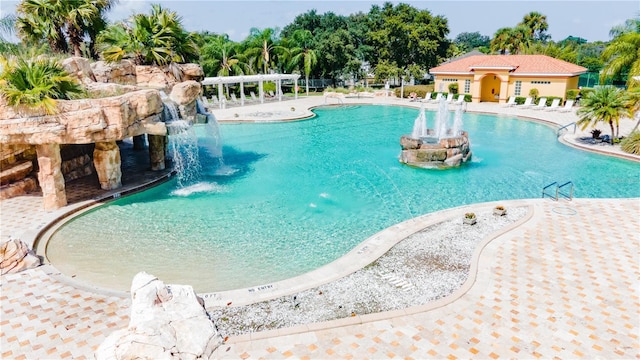 5437 Compass Pt Unit 00, Oxford, FL 34484 - community pool featuring a patio