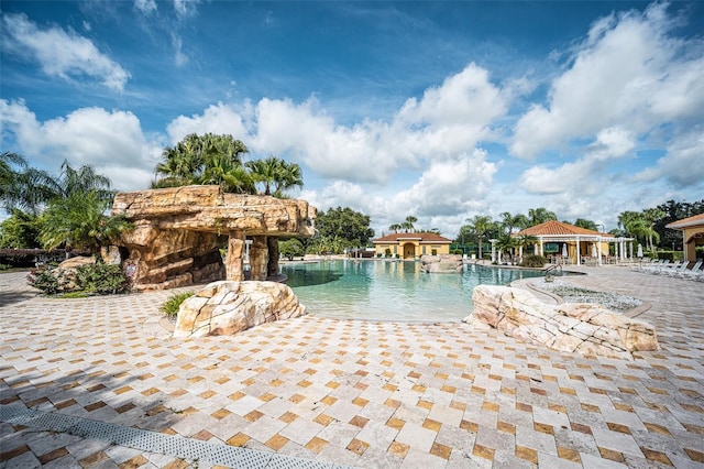 5437 Compass Pt Unit 00, Oxford, FL 34484 - community pool with a gazebo and a patio