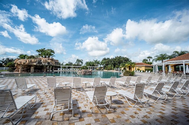 5437 Compass Pt Unit 00, Oxford, FL 34484 - community pool featuring a patio area