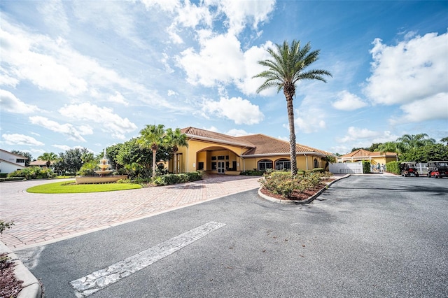 5437 Compass Pt Unit 00, Oxford, FL 34484 - view of asphalt road featuring curbs