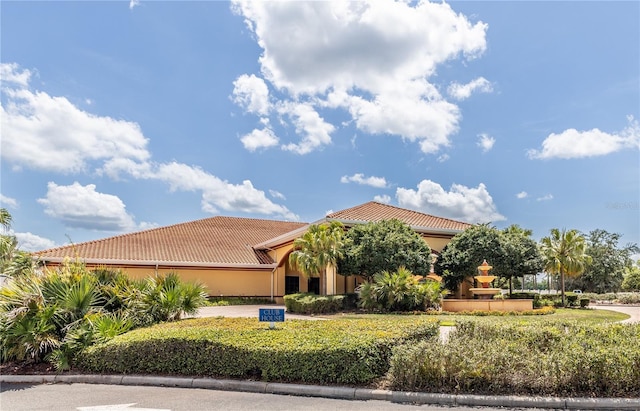 5437 Compass Pt Unit 00, Oxford, FL 34484 - mediterranean / spanish house featuring a tile roof and stucco siding