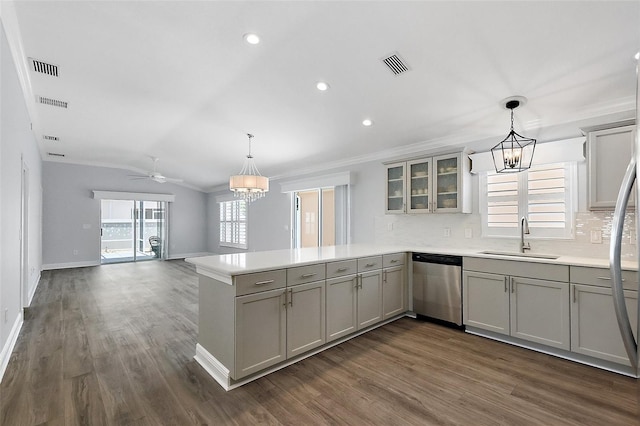 997 Oscar Ln, The Villages, FL 32162 - kitchen with a sink, stainless steel dishwasher, a chandelier, gray cabinets, and ornamental molding