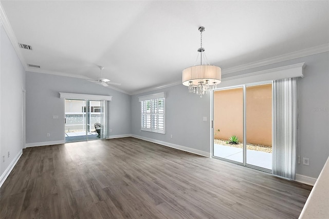997 Oscar Ln, The Villages, FL 32162 - spare room featuring crown molding, a chandelier, ceiling fan, dark wood-type flooring, and baseboards