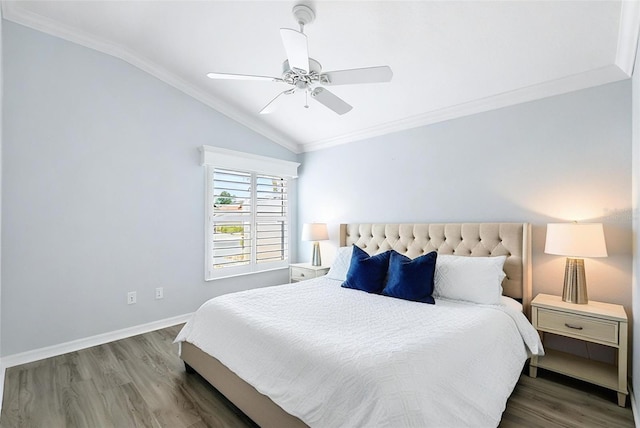 997 Oscar Ln, The Villages, FL 32162 - bedroom featuring wood finished floors, lofted ceiling, crown molding, ceiling fan, and baseboards