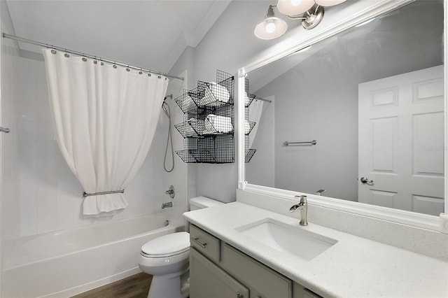 997 Oscar Ln, The Villages, FL 32162 - full bathroom featuring shower / tub combo, vanity, toilet, and wood finished floors