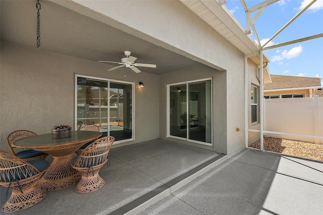 997 Oscar Ln, The Villages, FL 32162 - view of patio with a ceiling fan and glass enclosure