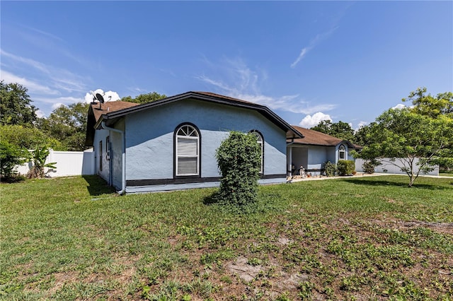 5521 Oak St, Mount Dora, FL 32757 - view of property exterior with stucco siding