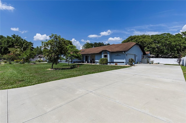 5521 Oak St, Mount Dora, FL 32757 - ranch-style house featuring driveway, a garage, and stucco siding