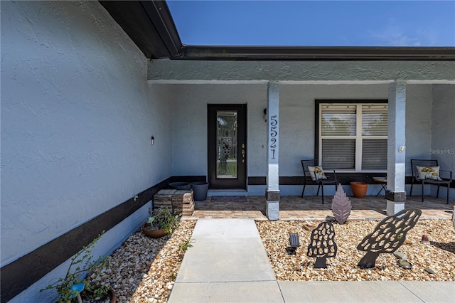 5521 Oak St, Mount Dora, FL 32757 - entrance to property with covered porch and stucco siding