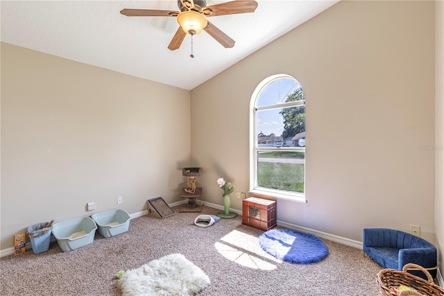 5521 Oak St, Mount Dora, FL 32757 - playroom with lofted ceiling, carpet flooring, baseboards, and a ceiling fan