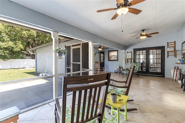 5521 Oak St, Mount Dora, FL 32757 - sunroom with french doors, a ceiling fan, healthy amount of natural light, and vaulted ceiling