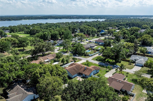 5521 Oak St, Mount Dora, FL 32757 - aerial view of residential area featuring a large body of water and a forest