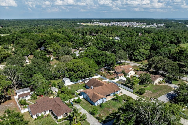 5521 Oak St, Mount Dora, FL 32757 - aerial view of residential area featuring a heavily wooded area