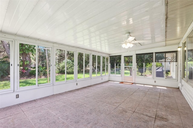 1011 Dundee Cir, Leesburg, FL 34788 - unfurnished sunroom featuring healthy amount of natural light and ceiling fan