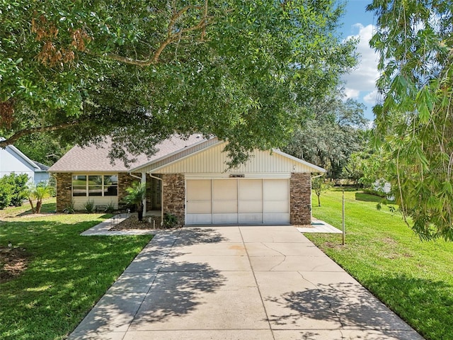 1011 Dundee Cir, Leesburg, FL 34788 - mid-century inspired home featuring stone siding, a front yard, and concrete driveway