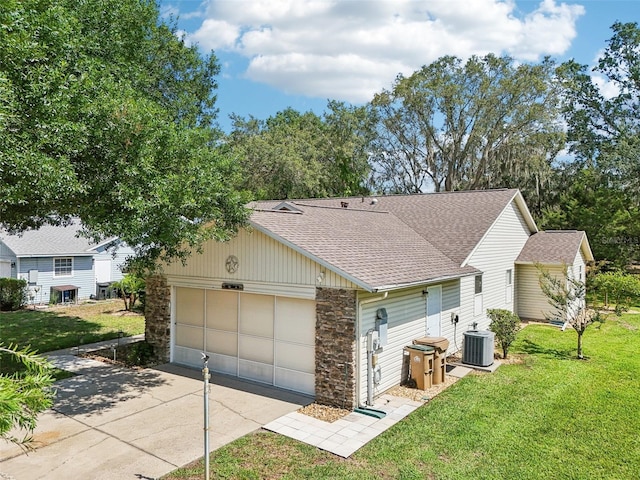 1011 Dundee Cir, Leesburg, FL 34788 - view of front of house with stone siding, a shingled roof, cooling unit, a front yard, and driveway