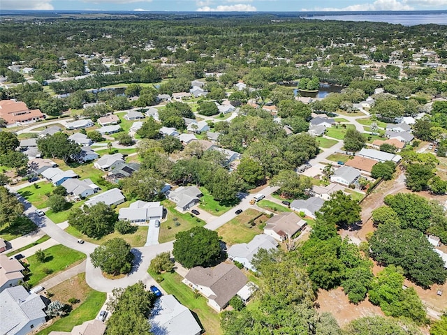 1011 Dundee Cir, Leesburg, FL 34788 - aerial view of residential area featuring a nearby body of water