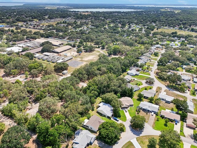 1011 Dundee Cir, Leesburg, FL 34788 - aerial view of residential area featuring a large body of water
