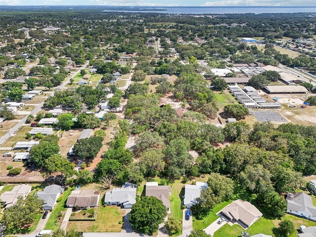 1011 Dundee Cir, Leesburg, FL 34788 - aerial view of property and surrounding area featuring nearby suburban area