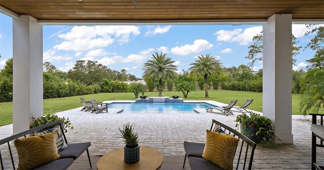 35449 Pinegate Trl, Eustis, FL 32736 - swimming pool featuring a patio area and a lawn