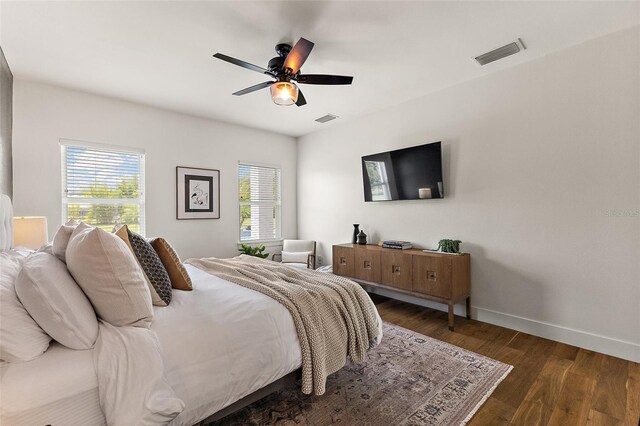 35449 Pinegate Trl, Eustis, FL 32736 - bedroom with wood finished floors and a ceiling fan