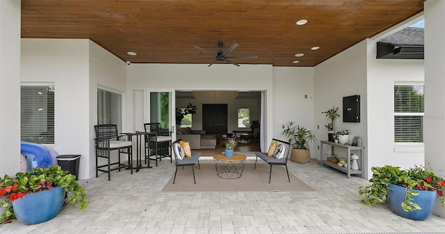 35449 Pinegate Trl, Eustis, FL 32736 - view of patio / terrace with a ceiling fan and an outdoor living space