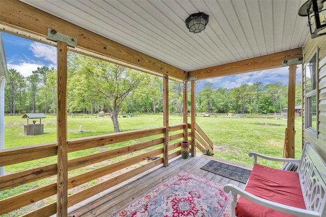 21320 Paradise Way, Eustis, FL 32736 - wooden terrace featuring view of wooded area and a yard