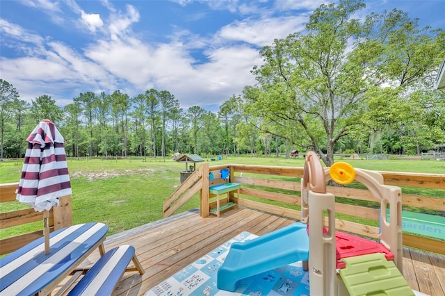 21320 Paradise Way, Eustis, FL 32736 - wooden deck with a yard and view of wooded area