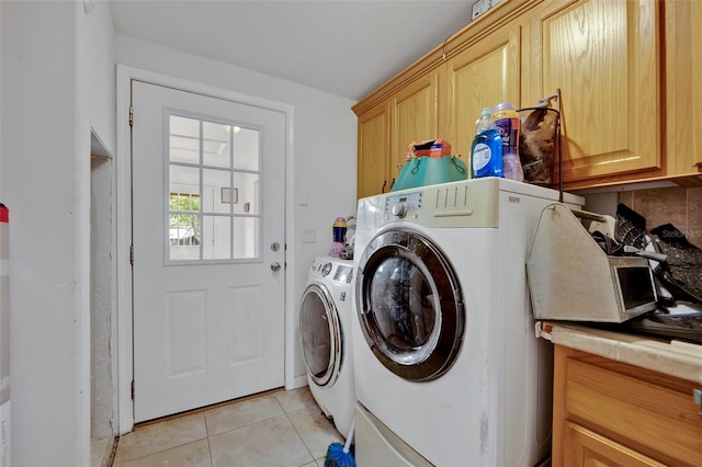 21320 Paradise Way, Eustis, FL 32736 - laundry room with cabinet space, independent washer and dryer, and light tile patterned floors