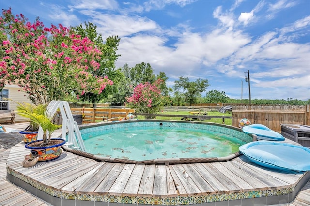 21320 Paradise Way, Eustis, FL 32736 - view of swimming pool featuring a deck and a fenced backyard