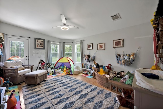 21320 Paradise Way, Eustis, FL 32736 - recreation room featuring plenty of natural light, a ceiling fan, and wood finished floors