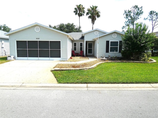 751 Old Oaks Ln, Leesburg, FL 34748 - single story home featuring a garage, driveway, and a front lawn