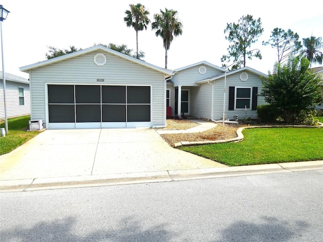751 Old Oaks Ln, Leesburg, FL 34748 - ranch-style home featuring concrete driveway, a front lawn, and an attached garage