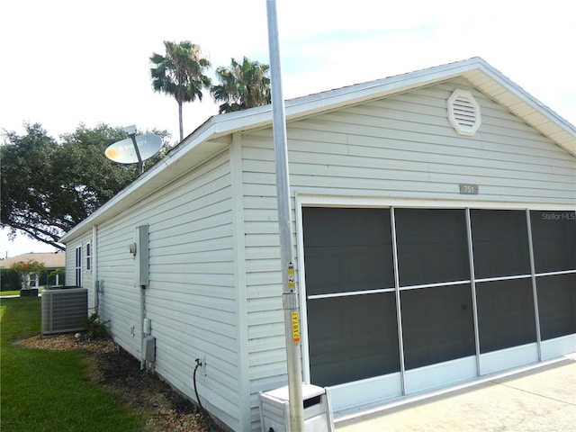 751 Old Oaks Ln, Leesburg, FL 34748 - garage featuring central AC unit