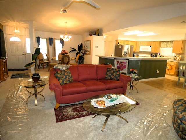 751 Old Oaks Ln, Leesburg, FL 34748 - living room with a chandelier and vaulted ceiling