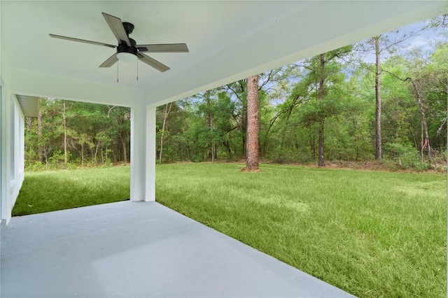 1115 W Geneva Pl, Citrus Springs, FL 34434 - view of grassy yard with ceiling fan and a patio