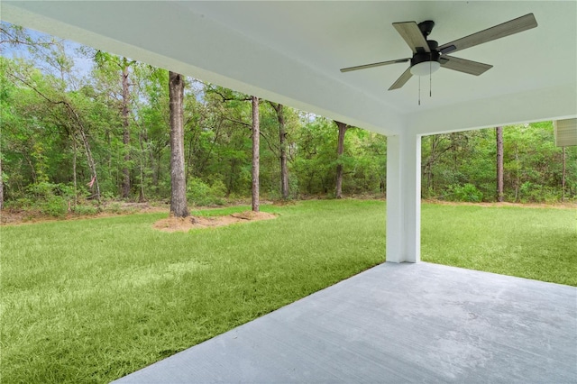 1115 W Geneva Pl, Citrus Springs, FL 34434 - view of green lawn featuring a ceiling fan and a patio