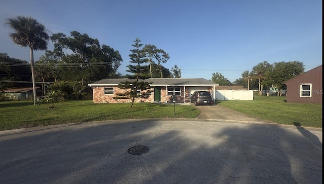 48 Pinehurst Cir, Ormond Beach, FL 32174 - single story home with driveway and brick siding