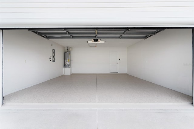 1313 Arredondo Dr, The Villages, FL 32162 - garage with gas water heater, electric panel, and a garage door opener
