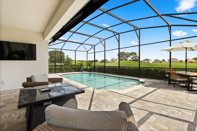 17700 Sawgrass Run, Tavares, FL 32778 - swimming pool featuring a patio and glass enclosure