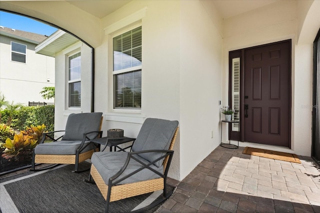 17700 Sawgrass Run, Tavares, FL 32778 - doorway to property with stucco siding