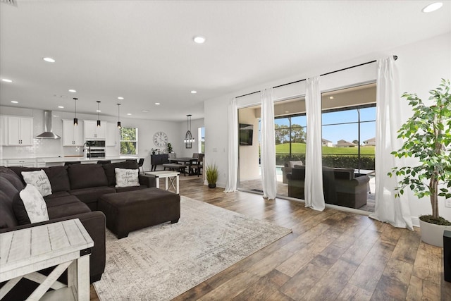 17700 Sawgrass Run, Tavares, FL 32778 - living area with wood-type flooring and recessed lighting