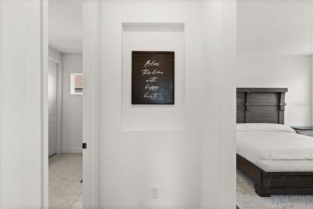 17700 Sawgrass Run, Tavares, FL 32778 - hallway featuring baseboards and tile patterned floors