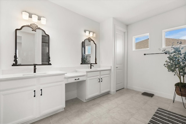 17700 Sawgrass Run, Tavares, FL 32778 - bathroom with two vanities and tile patterned flooring
