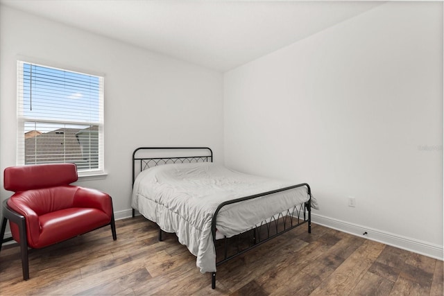 17700 Sawgrass Run, Tavares, FL 32778 - bedroom with wood finished floors and baseboards