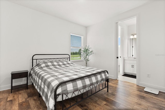 17700 Sawgrass Run, Tavares, FL 32778 - bedroom with wood-type flooring and connected bathroom