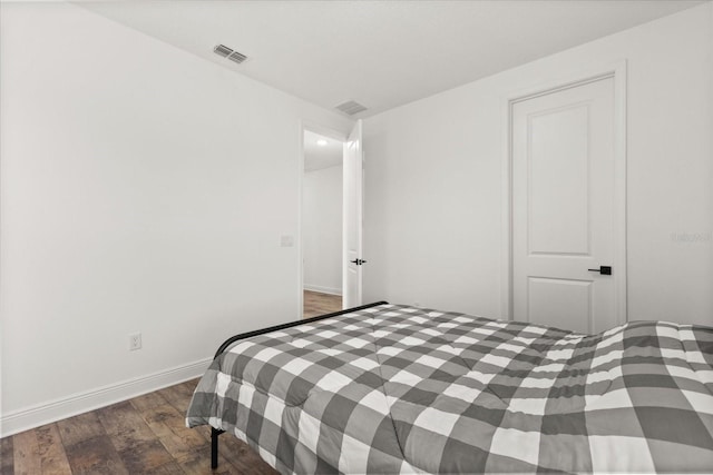 17700 Sawgrass Run, Tavares, FL 32778 - bedroom featuring wood finished floors and baseboards