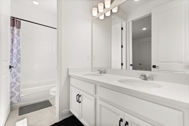 17700 Sawgrass Run, Tavares, FL 32778 - full bath featuring double vanity, shower / bath combination with curtain, tile patterned flooring, and recessed lighting