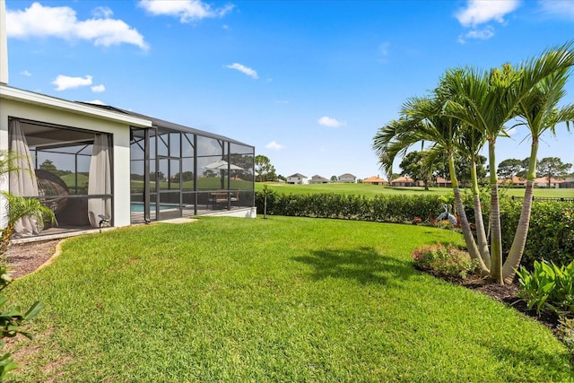 17700 Sawgrass Run, Tavares, FL 32778 - view of green lawn with an outdoor pool and glass enclosure